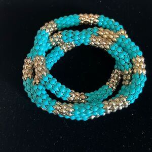 NWT turquoise and gold triple interlocking bracelet